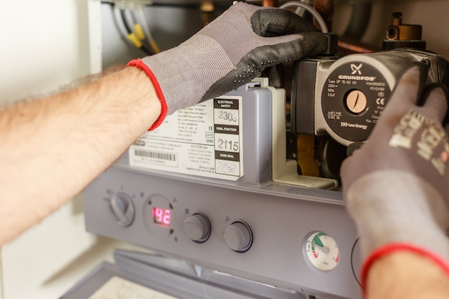 contractor working on a homes electrical system